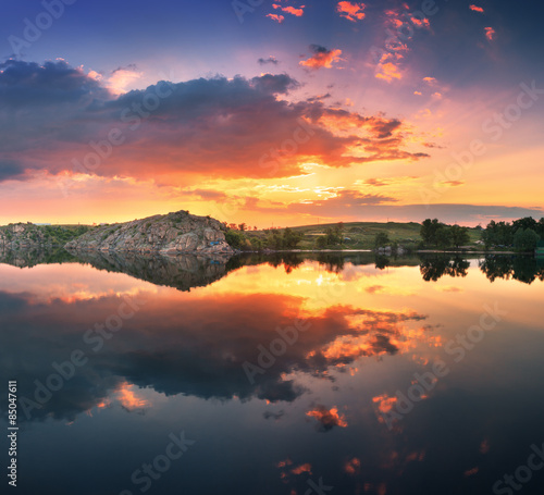 Plakat Beautiful summer sunset at the river with colorful sky
