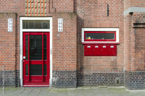 Fototapeta Door and Mailbox outside apartment building in Amsterdam
