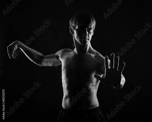 Fototapeta The lessons of self-defense. Martial Arts.