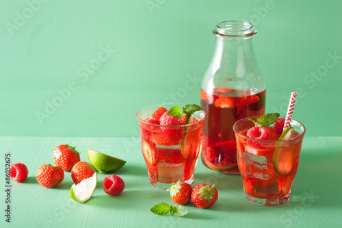Fototapeta summer strawberry raspberry lemonade with lime and mint