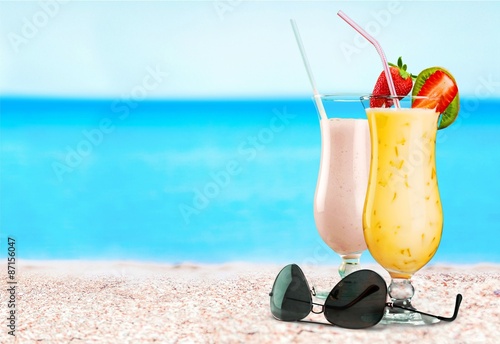 Fotoroleta plaża napój słoma brzeg